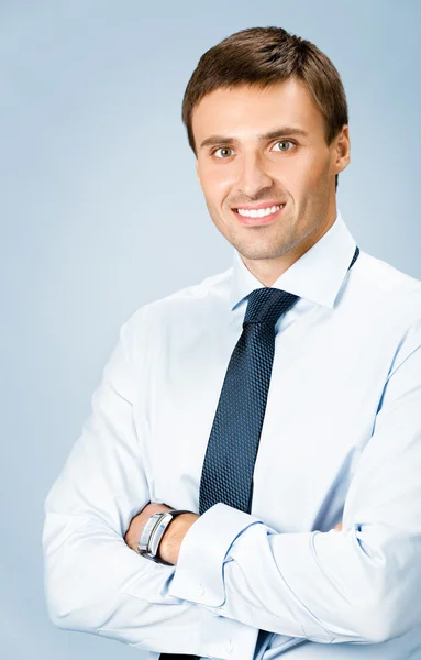 Retrato de homem de negócios, sobre fundo azul — Fotografia de Stock