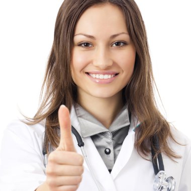 Doctor with thumbs up gesture, over white