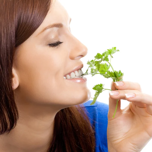 Cheerful woman eating potherbs, over white — Stock Photo, Image