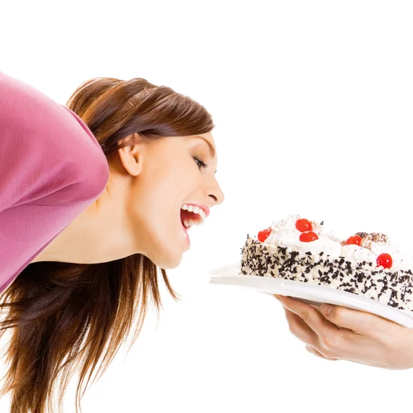 Mulher alegre comendo torta, sobre branco — Fotografia de Stock