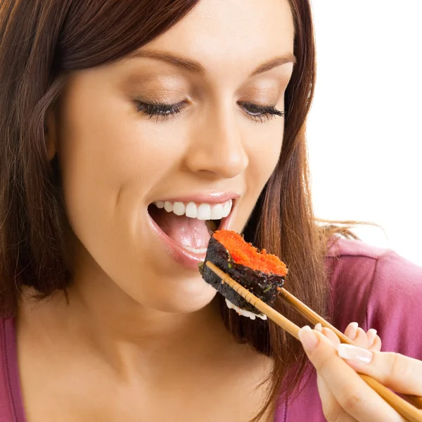 Mulher bonita comendo rolo de sushi, sobre branco — Fotografia de Stock