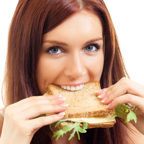 Mujer alegre comiendo sándwich con queso — Foto de Stock