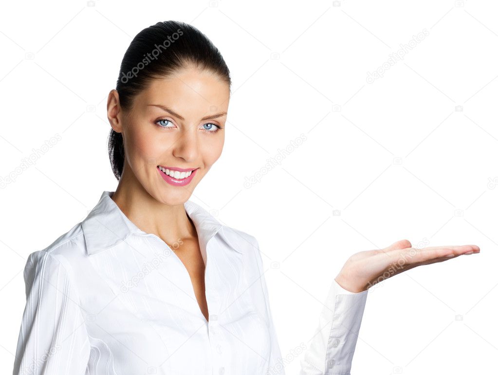 Cheerful businesswoman showing, over white