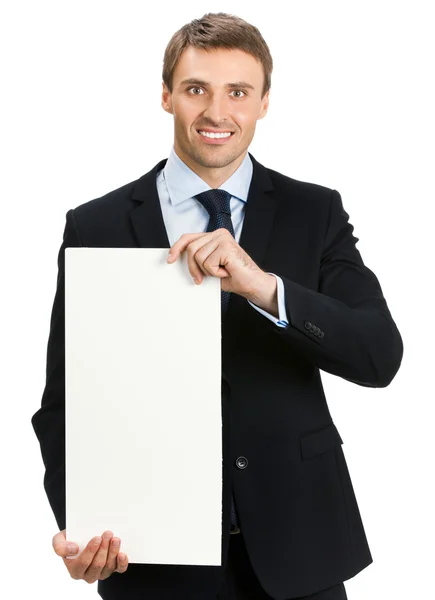 Happy businessman showing signboard, isolated — Stock Photo, Image