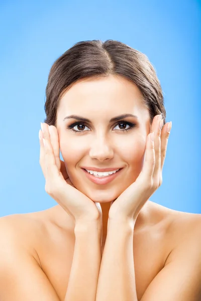 Portrait of beautiful woman, on blue — Stock Photo, Image