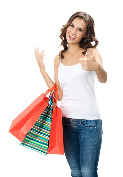 Młoda kobieta szczęśliwa z torby na zakupy, na białym tle — Zdjęcie stockowe