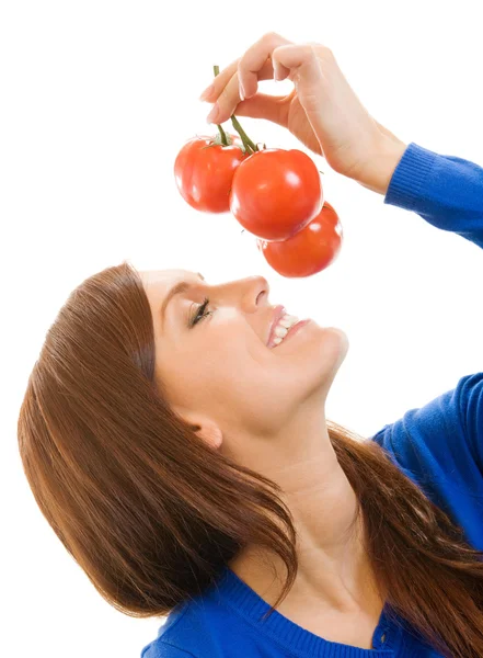 Mulher alegre com tomates, sobre branco — Fotografia de Stock