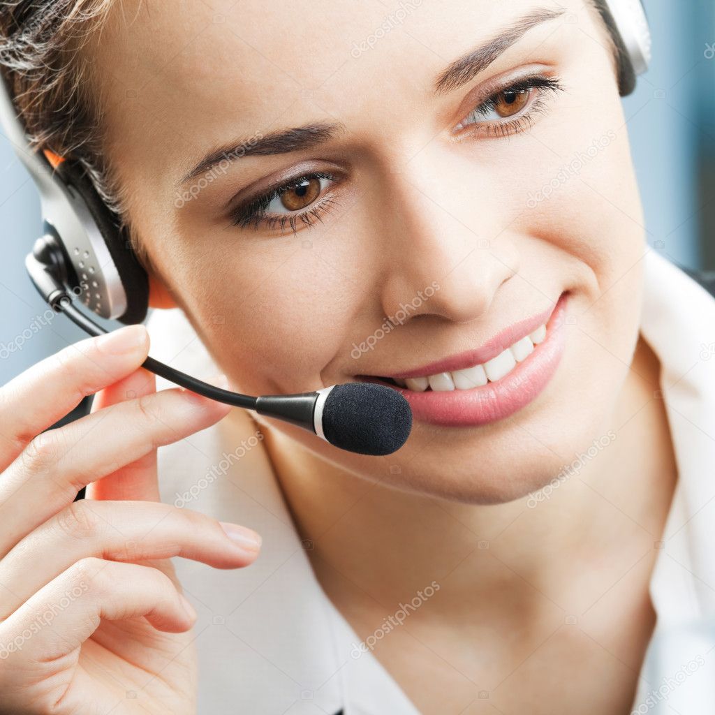Happy smiling support phone operator at office