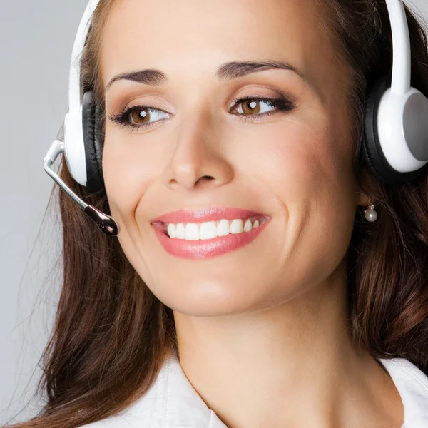 Support phone operator pointing, over gray — Stock Photo, Image