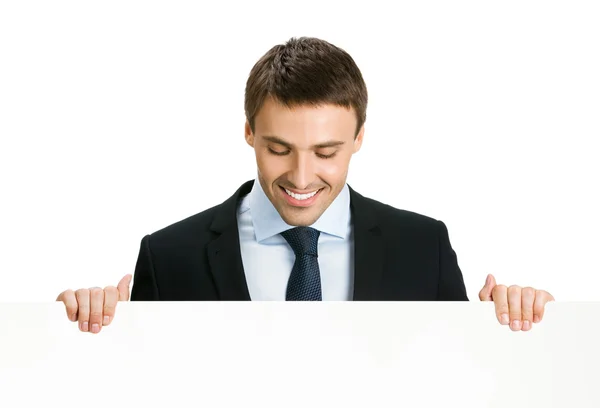 Empresário mostrando tabuleta em branco, isolado — Fotografia de Stock