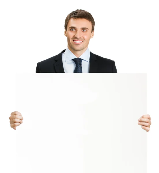 Businessman showing signboard, on white Royalty Free Stock Photos