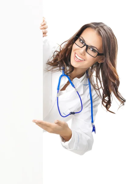 Doctor showing blank signboard, isolated — Stock Photo, Image