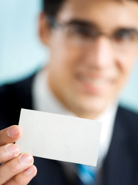 Businessman showing business card — Stock Photo, Image