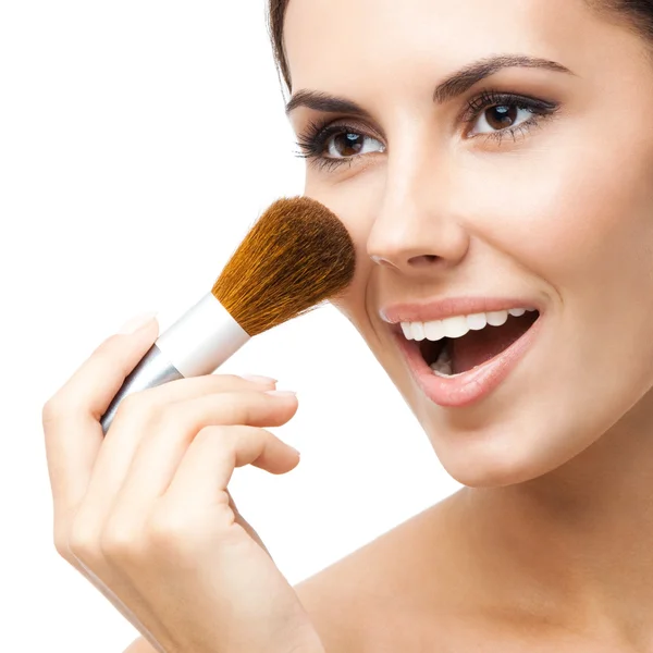 Young woman with cosmetics brush, isolated — Stock Photo, Image