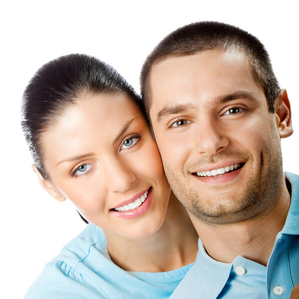 Portrait of young happy smiling embracing couple