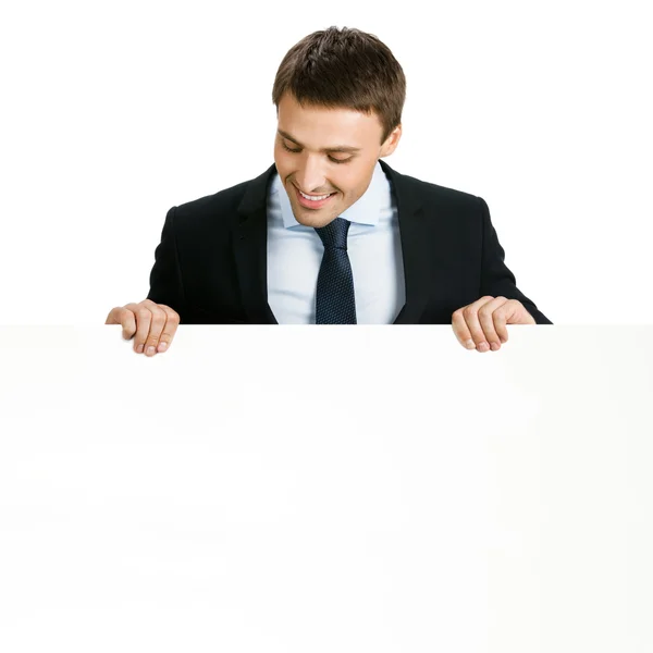 Affärsman som visar skylt, vit — Stockfoto