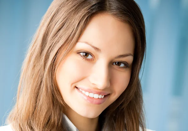 Cheerful female doctor at office — Stock Photo, Image