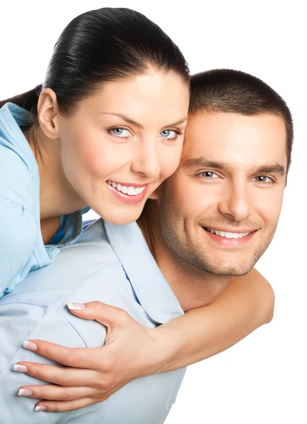 Portrait of young happy smiling attractive couple, isolated on w — Stock Photo, Image