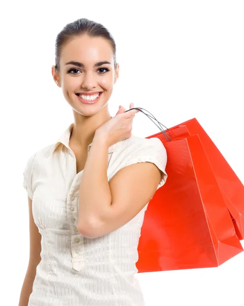 Junge glückliche Frau mit Einkaufstaschen, isoliert — Stockfoto