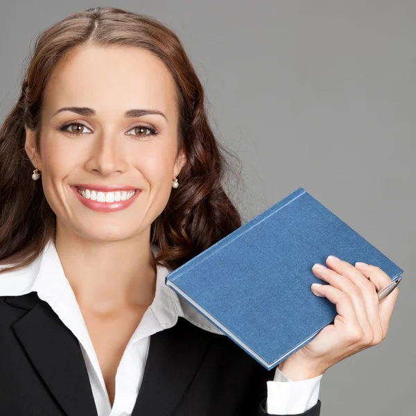 Businesswoman with notepad or organizer — Stock Photo, Image