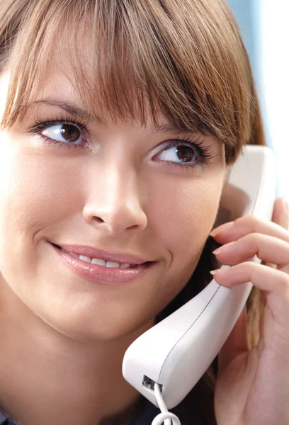 Young woman with phone, at office — Stock Photo, Image