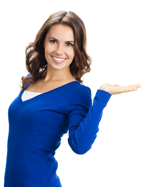 Beautiful young woman showing, on white