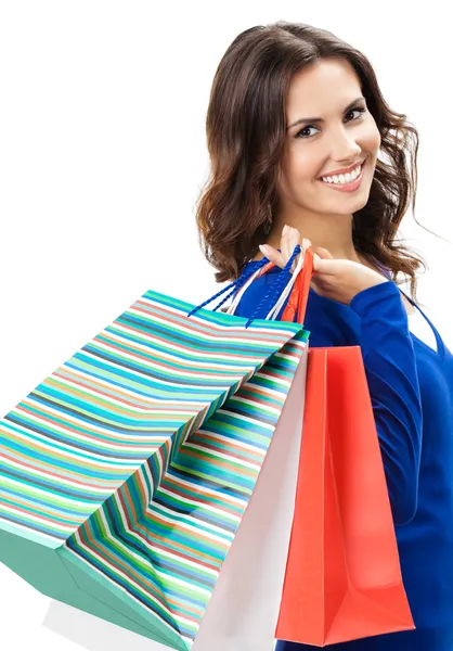Young happy woman with shopping bags, isolated Stock Picture