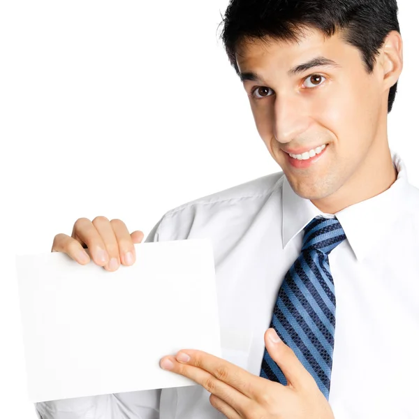 Portret van gelukkig lachend jonge zakenman tonen leeg bord, geïsoleerd — Stockfoto
