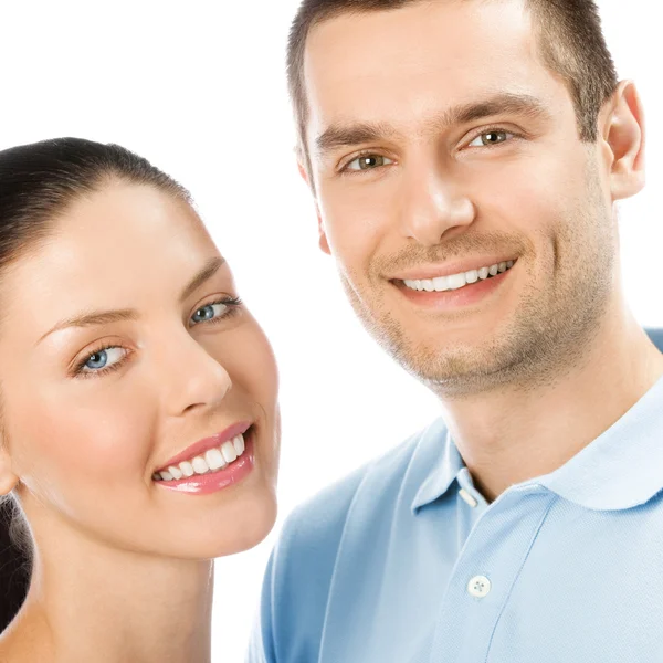 Portrait of young happy smiling attractive couple, isolated on w — Stock Photo, Image