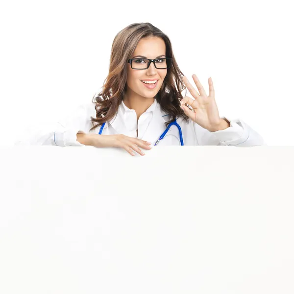 Doctor showing blank signboard, isolated — Stock Photo, Image