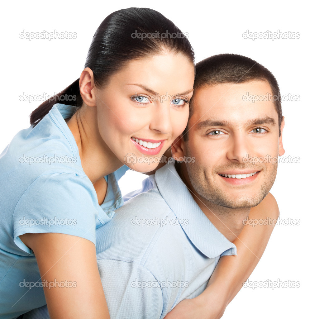 Portrait of young happy smiling attractive couple, isolated on w