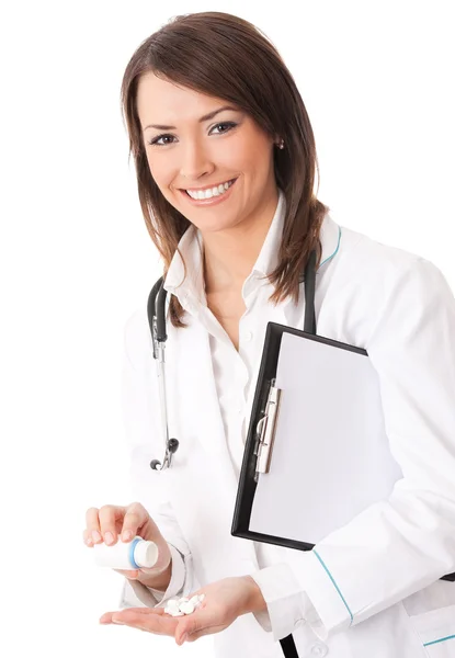 Cheerful doctor showing medical drug, over white Royalty Free Stock Photos