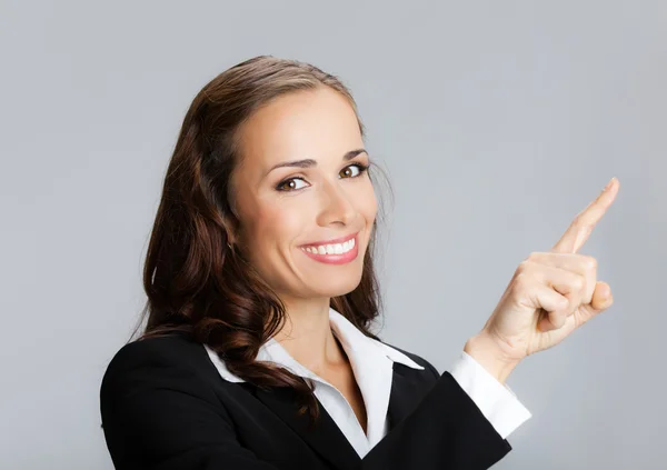 Businesswoman showing — Stock fotografie