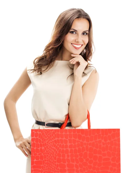 Young happy woman with shopping bags, isolated — Stock Photo, Image