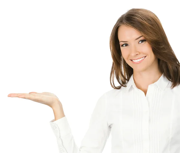 Businesswoman showing something or holding, over white Stock Image