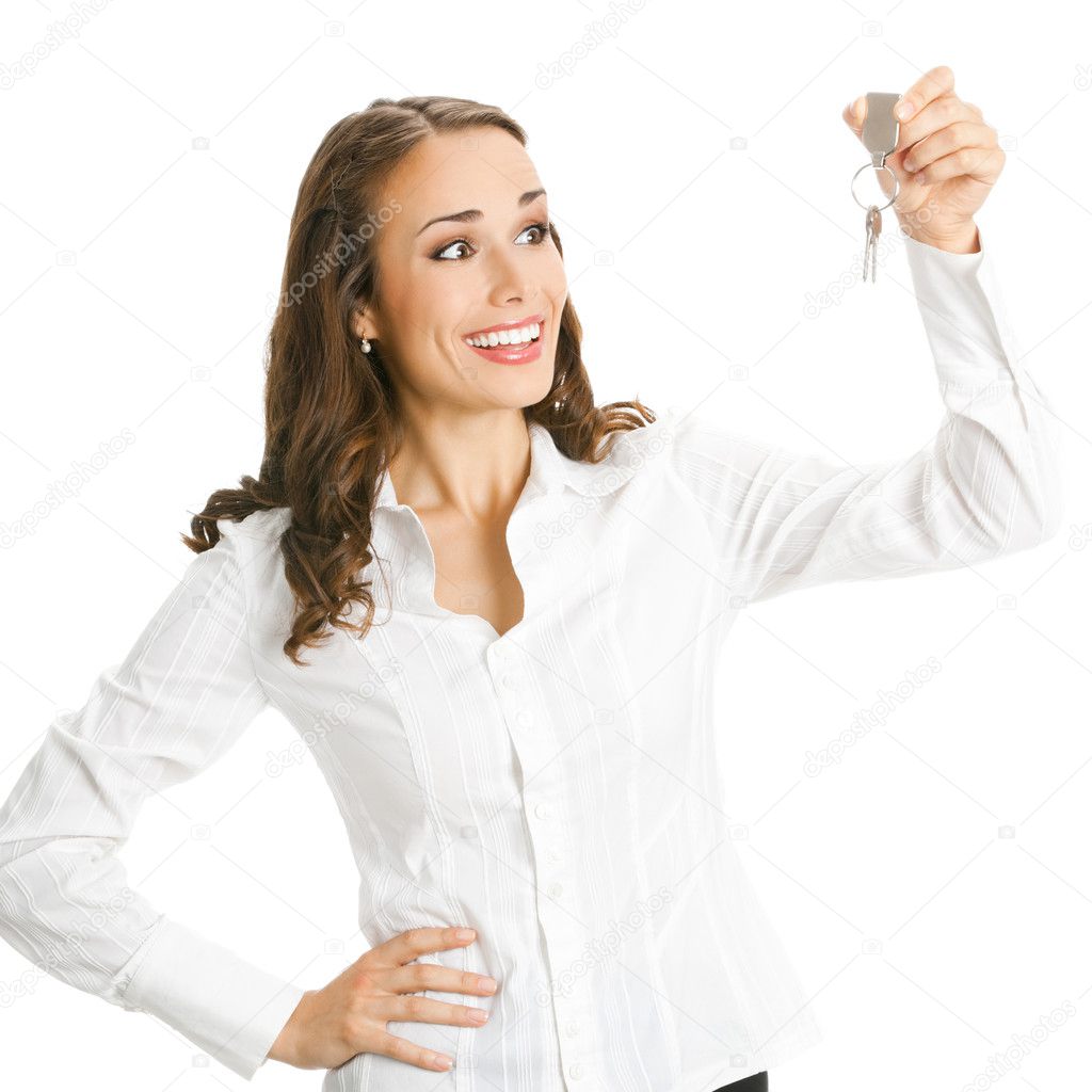 Businesswoman or real estate agent showing keys