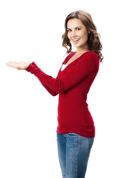 Beautiful young woman showing something, on white — Stock Photo, Image