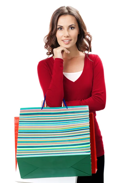 Jeune femme heureuse avec des sacs à provisions, isolé — Photo