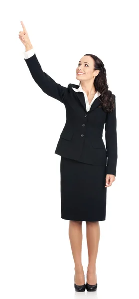 Giovane donna d'affari mostrando qualcosa, su bianco — Foto Stock