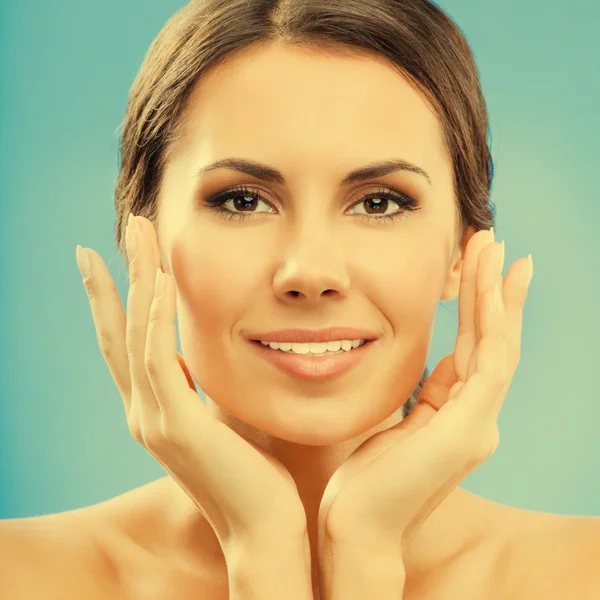 Portrait of beautiful woman, on blue — Stock Photo, Image