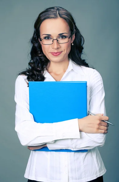 Businesswoman with folder, on gray — Stock Photo, Image