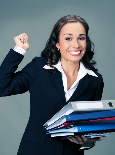 Businesswoman with folders, on gray — Stock Photo, Image