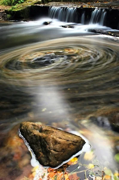 Stone in water — Stock Photo, Image