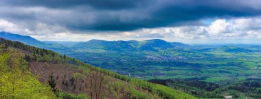 Panoramic view of the mountain spring landscape from the foothills of the Beskydy Mountains