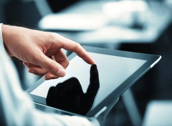 Tablet in hand — Stock Photo, Image