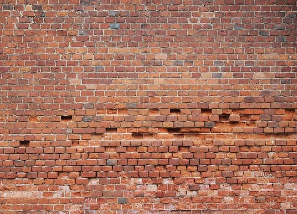 Bruine bakstenen muur — Stockfoto