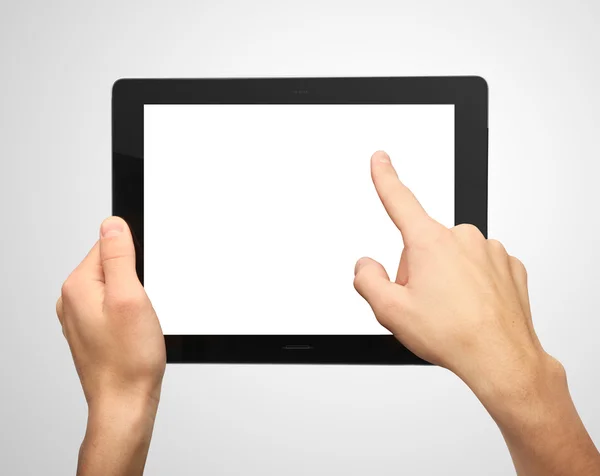 Hands pushing tablet — Stock Photo, Image