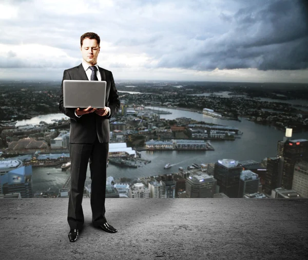 Businessman and city — Stock Photo, Image