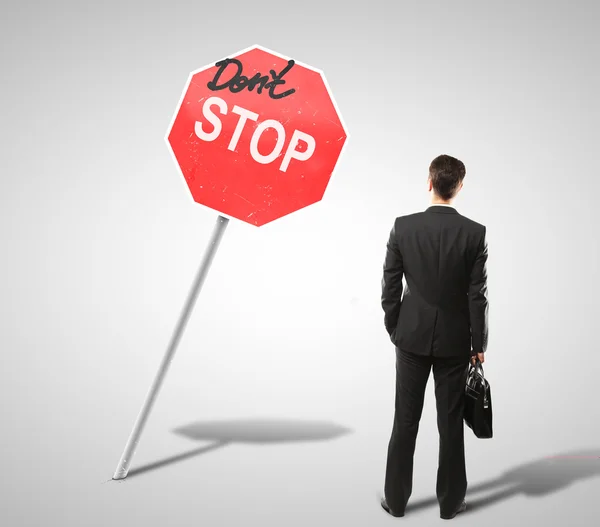 Man and stop sign — Stock Photo, Image