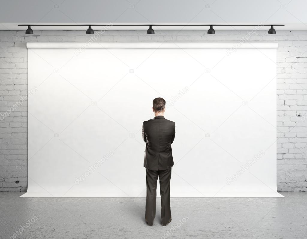 man and white backdrop